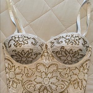 White bustier with gold beaded accents!